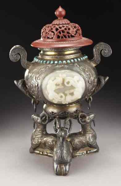 Appraisal: Chinese jade inlaid silver incense burner raised on three ram's