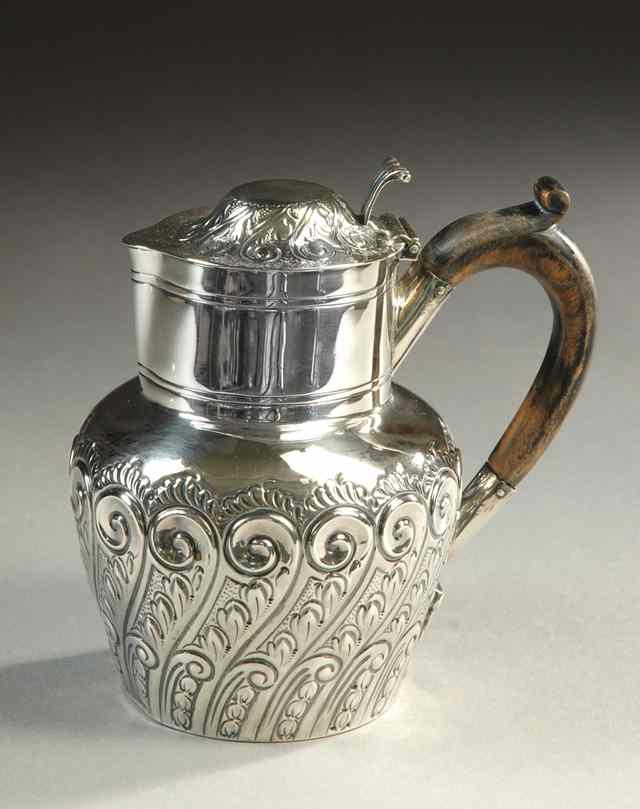 Appraisal: BRITISH STERLING SILVER SYRUP PITCHER with wood handle Hallmarked Birmingham