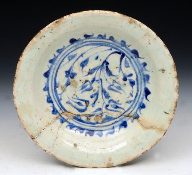 Appraisal: A TH CENTURY SYRIAN FRITWARE BLUE AND WHITE CIRCULAR DISH