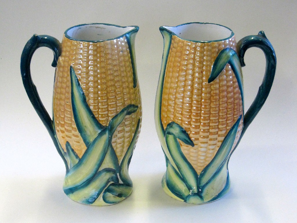 Appraisal: Pair of pottery corn on the cob jugs