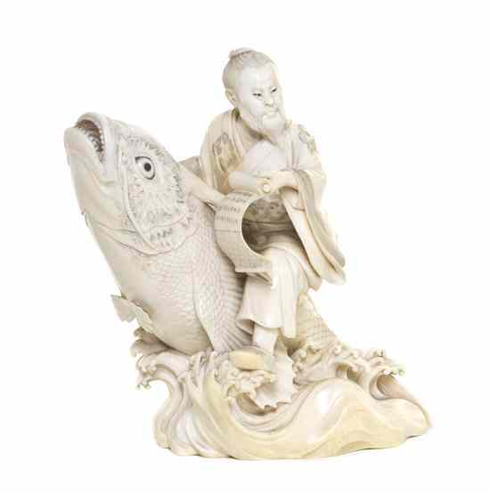 Appraisal: A Japanese Ivory Okimono of Kinko Riding a Carp the