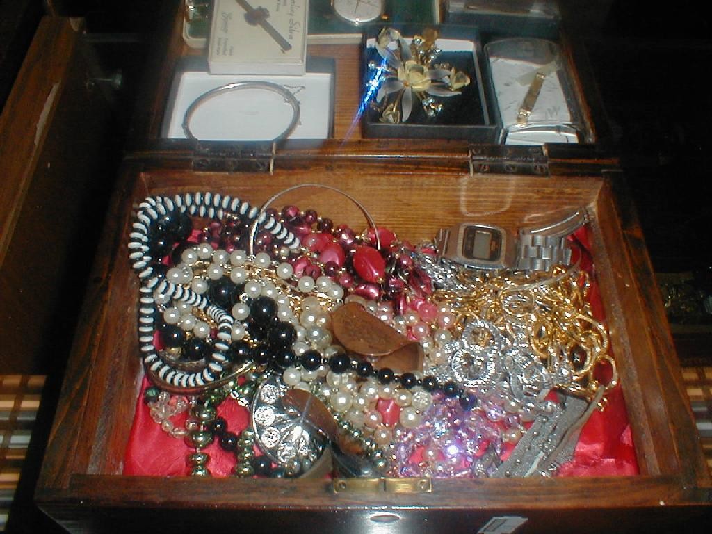 Appraisal: Wooden box and contents of mainly costume jewellery and a