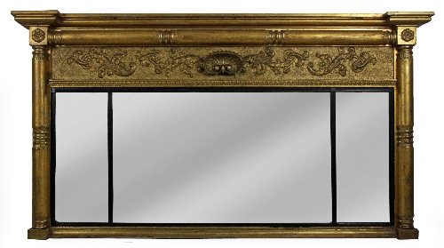 Appraisal: A Regency gilt framed overmantel mirror the frieze centred by