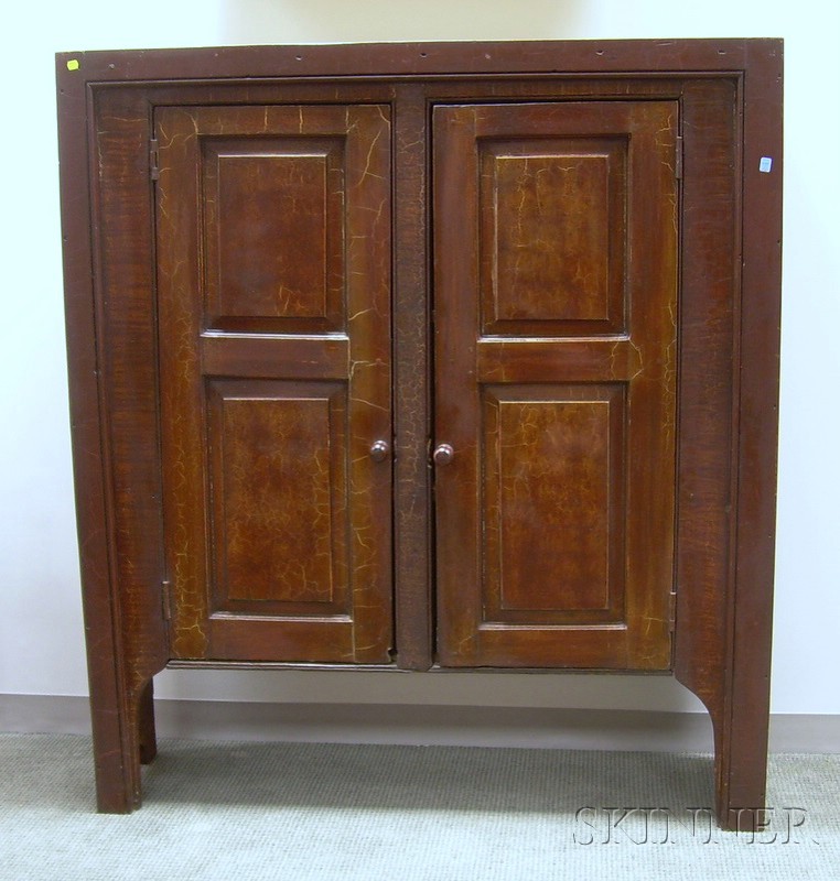 Appraisal: Grained and Painted Wooden Cupboard with Two Paneled Doors raised