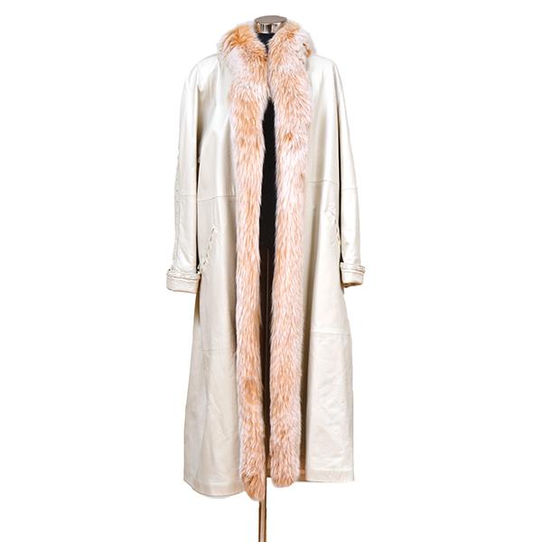 Appraisal: A FULL LENGTH IVORY LEATHER AND FOX FUR TRIM COAT