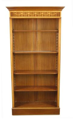 Appraisal: A modern mahogany and crossbanded standing open bookcase the frieze