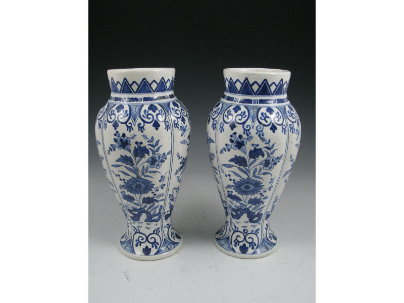 Appraisal: Pair of Delft Blue White Vases th c -