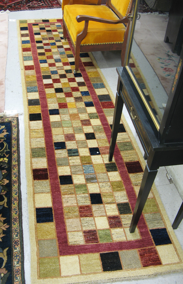 Appraisal: HAND KNOTTED ORIENTAL RUNNER Pakistani contemporary overall mixed color checkerboard