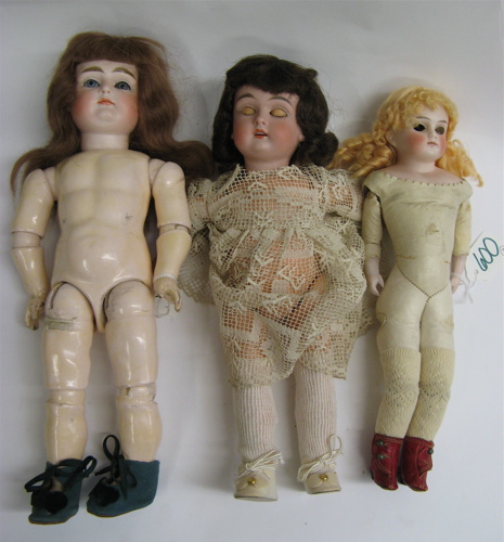 Appraisal: THREE BISQUE HEAD GIRL DOLLS Bisque socket head brown human