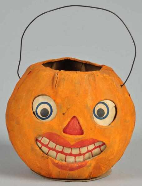 Appraisal: Early Paper Mache Female Jack-O-Lantern Description With red lips and