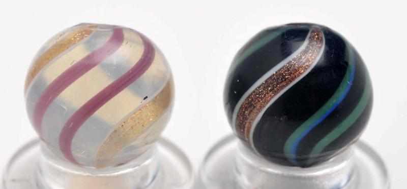 Appraisal: Lot of Banded Lutz Marbles Description Includes one with opalescent