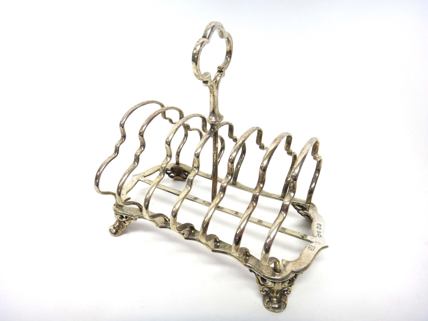 Appraisal: A Victorian silver seven bar toastrack of shaped rectangular form