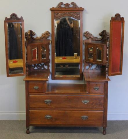 Appraisal: Edwardian Walnut Dressing Table With fold out mirrors beveled glass