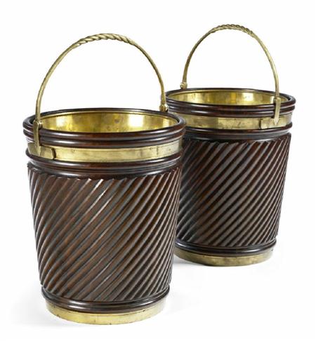 Appraisal: A pair of Irish mahogany and brass-bound peat buckets In