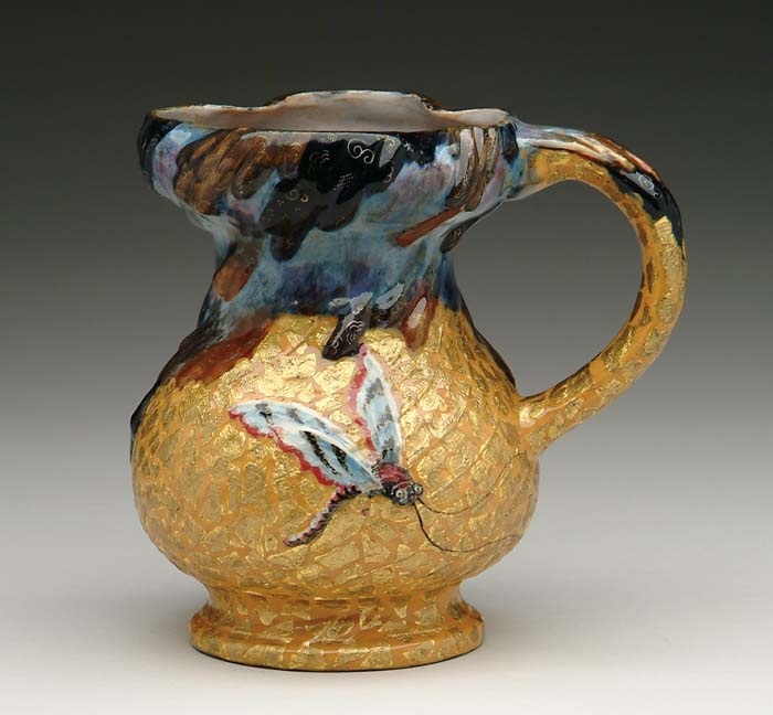 Appraisal: GALLE FAIENCE EWER Beautifully decorated with a fanciful dragonfly on