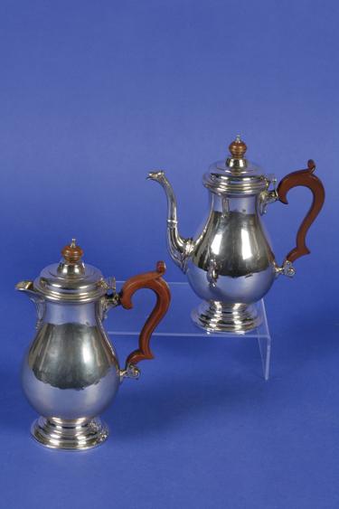 Appraisal: GEORGE V COFFEE POT of baluster form with a stepped