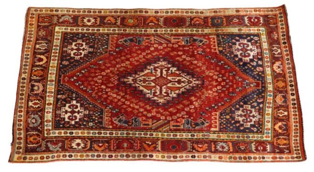 Appraisal: Hand-tied Persian Shiraz Qashqai rug Iran retaining maker's tag approx