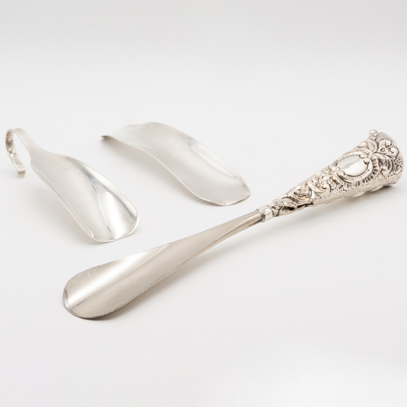 Appraisal: GROUP OF THREE SILVER SHOE HORNS Comprising A Tiffany Co