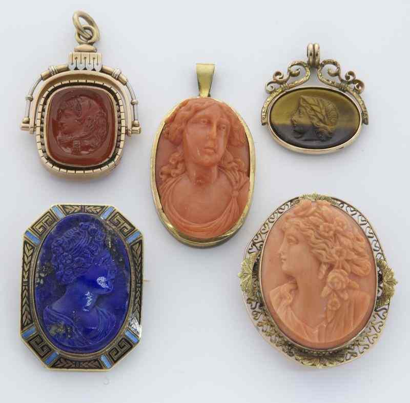 Appraisal: Victorian hard stone gold and cameo busts pendants and brooches