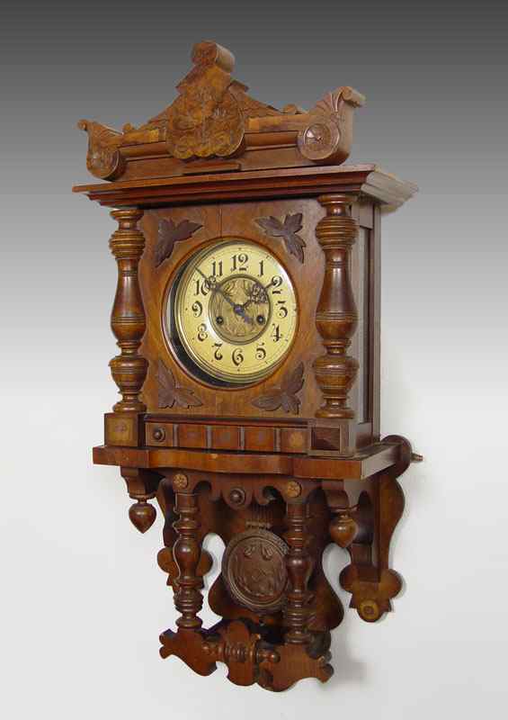 Appraisal: GUSTAV BECKER CARVED GERMAN WALL CLOCK With carved turned and