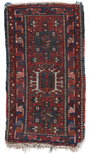 Appraisal: Heriz rug c stylized floral design on a red field