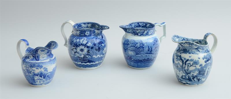 Appraisal: GROUP OF FOUR STAFFORDSHIRE BLUE TRANSFER-PRINTED PITCHERS Comprising Nell Cottage