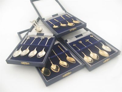 Appraisal: Three modern cased sets of four silvergilt 'trump' tea spoons