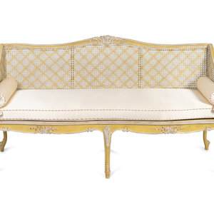 Appraisal: A Louis XV Style Caned and Cream-Painted Settee Height x