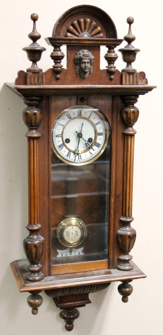 Appraisal: A thC walnut cased Vienna wall clock of small proportion