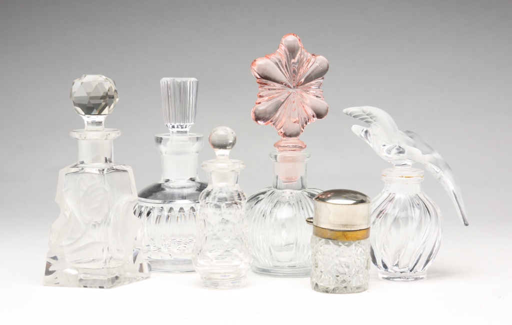 Appraisal: SIX CLEAR GLASS PERFUME BOTTLES European th century Pressed glass