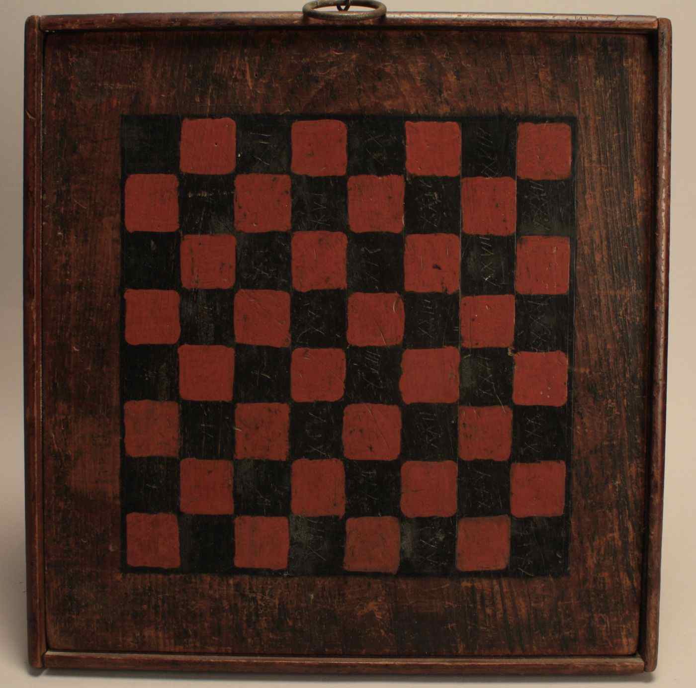 Appraisal: FRAMED CHECKERBOARD IN RED AND BLACKEarly th CenturyBlack bordered board