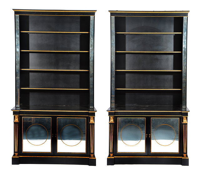 Appraisal: A PAIR OF LARGE EBONISED BOOKCASES by Julian Chichester the