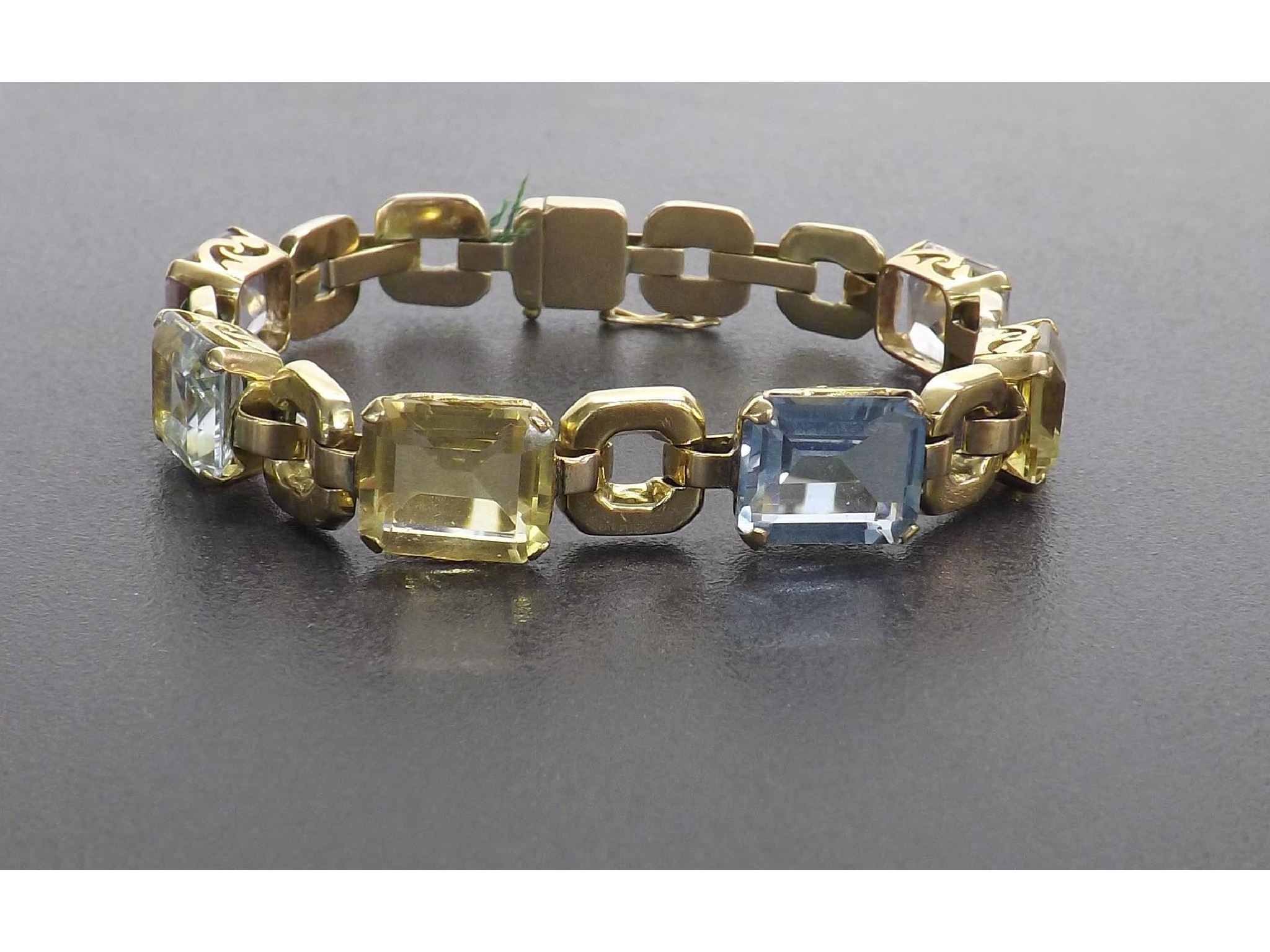 Appraisal: Yellow gold gem set bracelet with topaz morganite citrine aquamarine