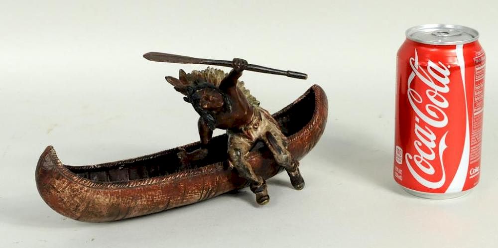 Appraisal: Carl Kauba Indian and Canoe Painted Bronze Carl Kauba Austrian