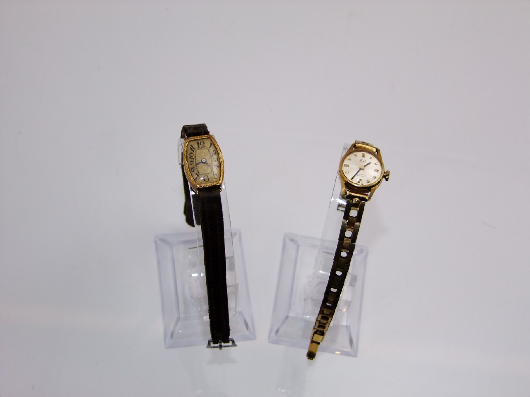 Appraisal: A lady's ct gold wristwatch the tonneau-shaped textured dial with