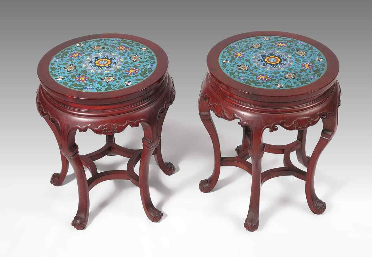 Appraisal: PAIR CLOISONNE TOP LOW TABLES Carved wood bases with cloisonne