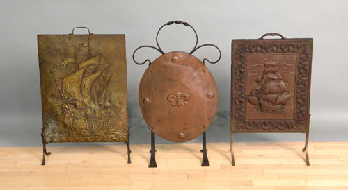 Appraisal: Three embossed brass firescreens - h