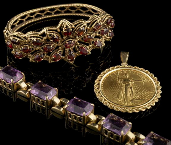 Appraisal: Fourteen-Karat Yellow Gold and Garnet Bangle Bracelet in the Victorian