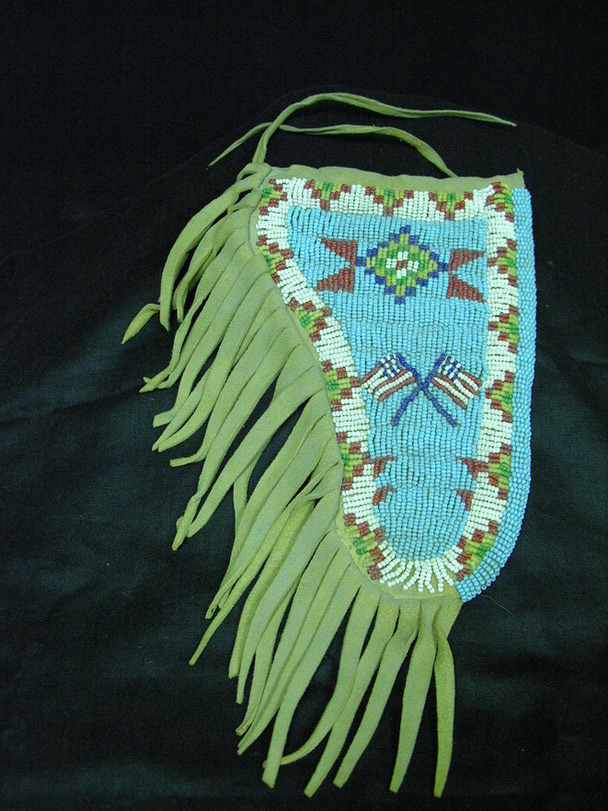 Appraisal: NATIVE AMERICAN BEADED HOLSTER Beautifully beaded geometric design above crossed