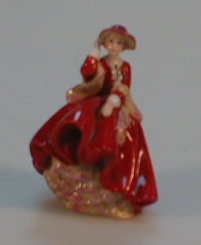 Appraisal: A miniature Royal Doulton figurine Top of the Hill No