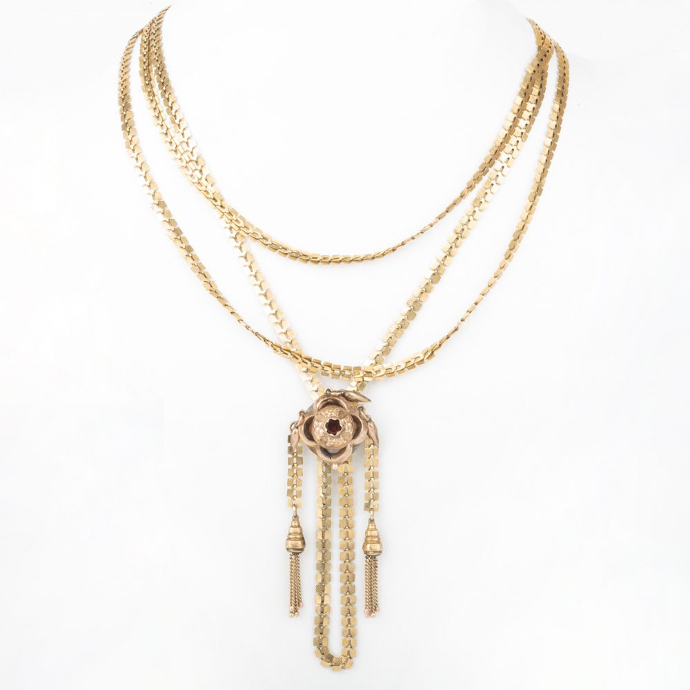 Appraisal: k Gold Long Chain Necklace and Pendant Set with Garnet