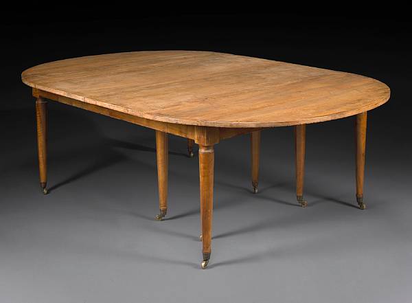 Appraisal: A Louis XVI style walnut extension dining table The hinged