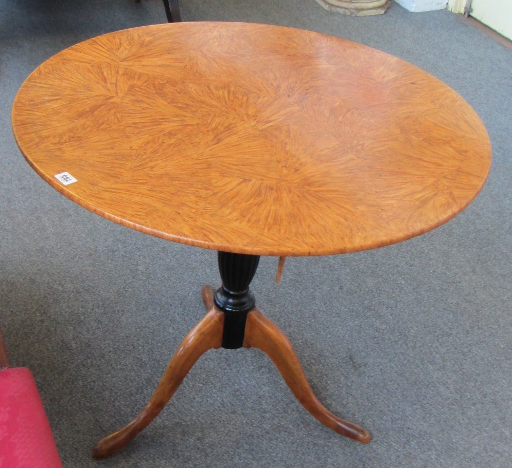 Appraisal: A Scandinavian figured satin birch and ebonised circular snap top