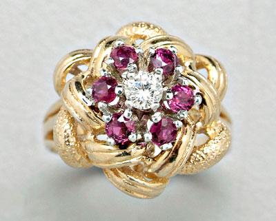 Appraisal: Diamond and ruby ring one round brilliant diamond estimated weight