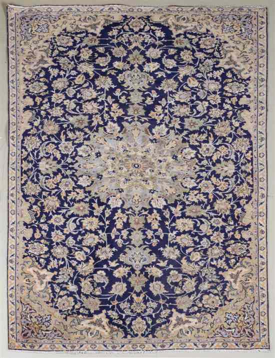 Appraisal: A Kashan Wool Rug having allover foliate and floral decoration