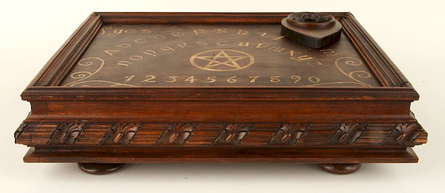 Appraisal: NICELY CARVED CASED WOOD OUIJA BOARD GOTHIC TASTE A nicely