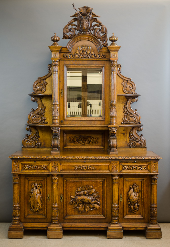 Appraisal: LARGE CARVED OAK HUNTING LODGE SIDEBOARD English th century in