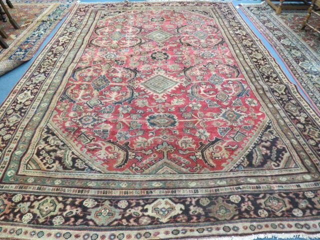 Appraisal: Mahal Persian Handmade Room Size Rug geometric stylized florals salmon