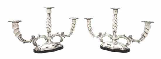 Appraisal: A Pair of American Sterling Silver Three-Light Candelabra having twist