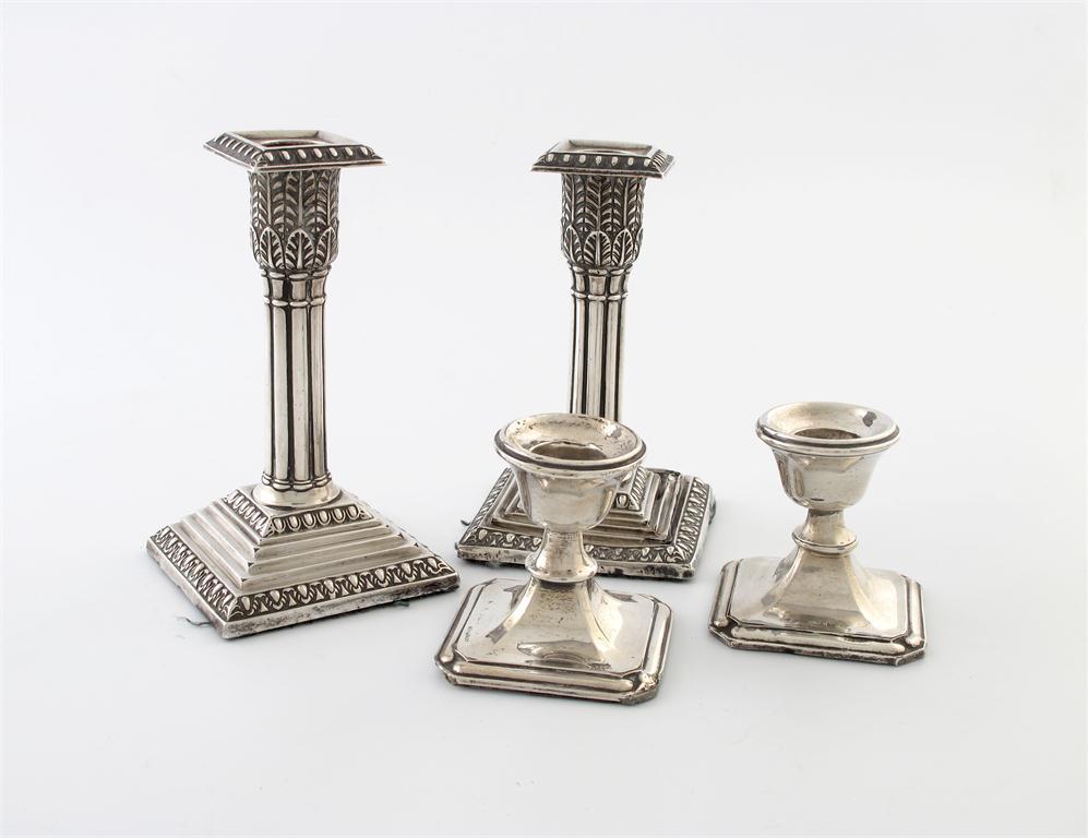 Appraisal: A pair of Edwardian silver candlesticks